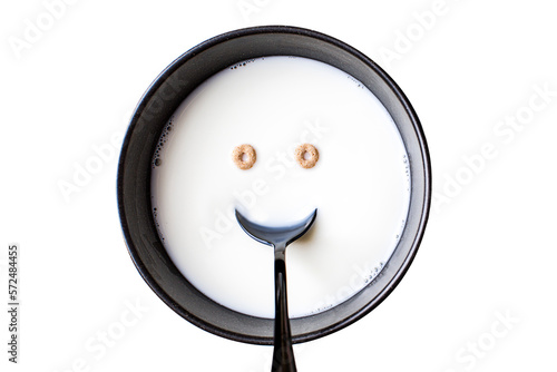 Cereal and milk with a happy face. Isolated on white