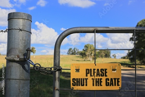 Gunnedah, New South Wales, Australia, 06012022: Please shut the gate sign on a country property. photo