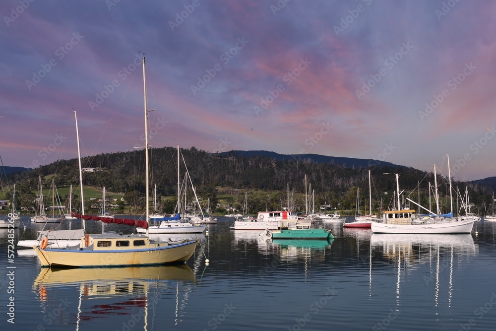 Cygnet, Tasmania, Australia, 06092022: Boats anchored on Gardners Bay.