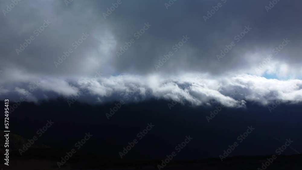 Drone view of Low dark Clouds On Madeira Island Mountains, Pan Shot of Mysty Sky Drone view of Low dark Clouds On Madeira Island Mountains, Pan Shot of Mysty Sky