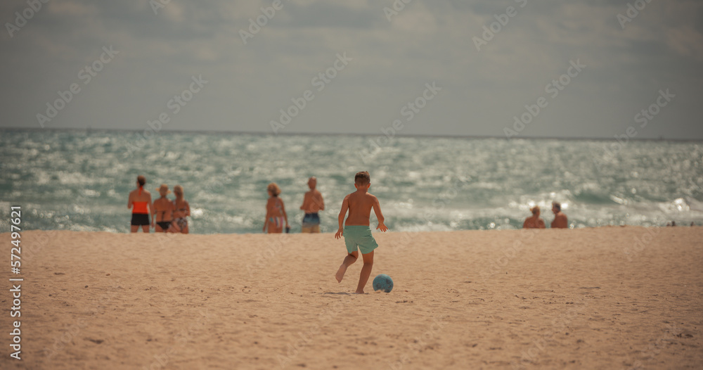 children playing on the beach people vacation miami Florida children playing on the beach people vacation miami Florida