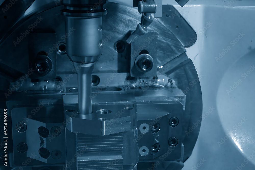 The 5-axis CNC milling machine hole cutting on the metal part. The 5-axis CNC milling machine hole cutting on the metal part.