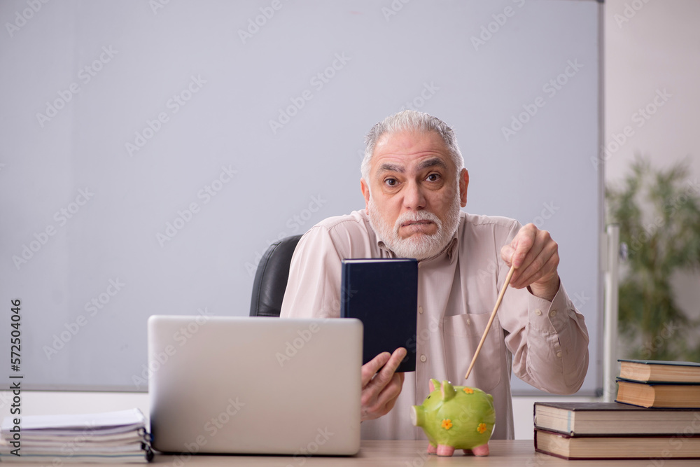 Old male teacher in retirement concept Old male teacher in retirement concept