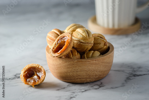 cookies in the form of nuts with caramel photo