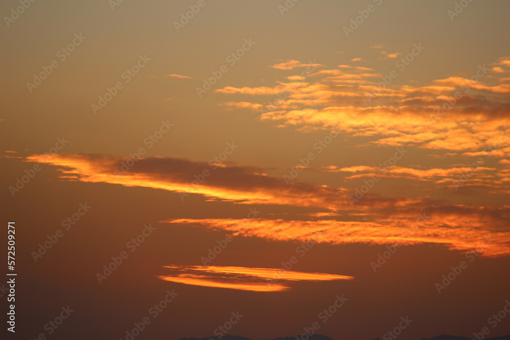red sunset sky in the clouds, golden hour abstract clouds, orange cumulus cloud