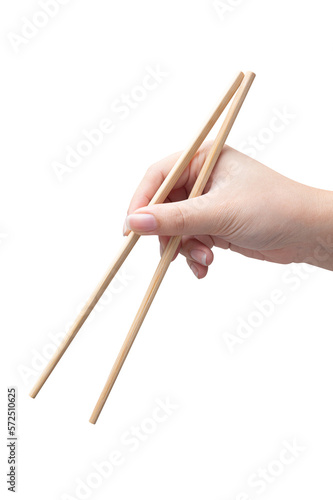 isolated of a woman's hand holding a wood chopstick.