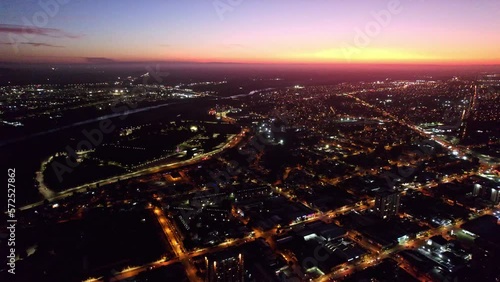 City of Temuco, Chile, Aerial View Above Cityscape of Cautin Province at Night, Sunset Horizon, Houses and Streets of the Chilean Town photo