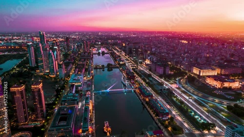 Aerial Hyperlapse above Puerto Madero, Buenos Aires, Argentina Modern Cityscape Sunset of Famous Urban Waterfront and Central Business District photo
