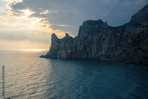 View of Karaul-Oba mountain Cape Chicken-Kaya and Blue bay on sunset. Noviy Svet. Crimea