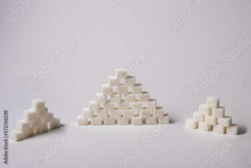 pyramid of sugar cubes on a white background. close-up
