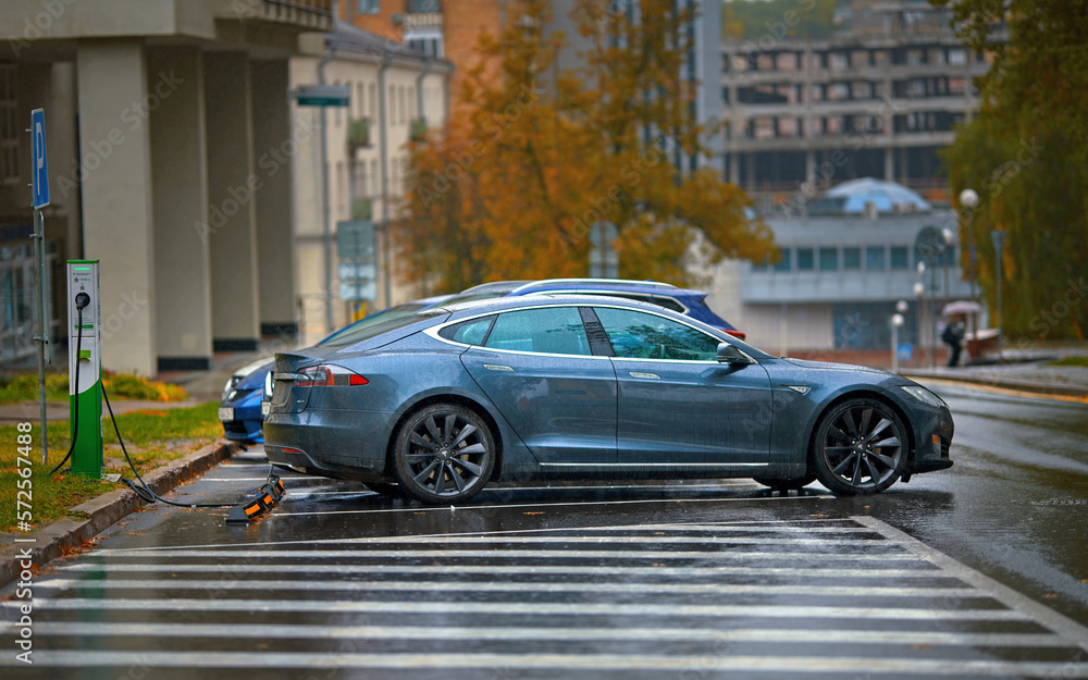Minsk, Belarus. Oct 2022. Tesla Model S charging battery at free