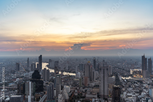 Bangkok cityscape top view and Chaophraya river in twilight time. Civilization city traveler and tourism destination with copy space.