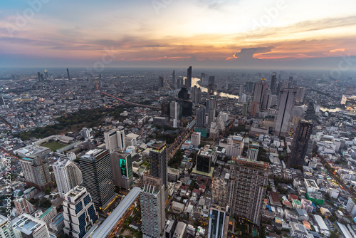 Bangkok cityscape top view and Chaophraya river in twilight time. Civilization city traveler and tourism destination with copy space.