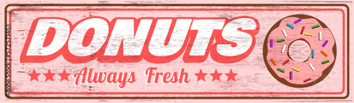 Vintage donuts sign on wood