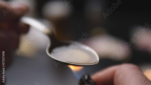 addict preparing dose of crack 4k slow motion