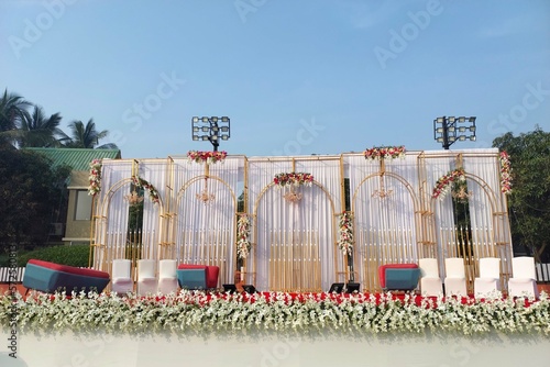 Photography India Wedding event stage decorated with flower, chair, light