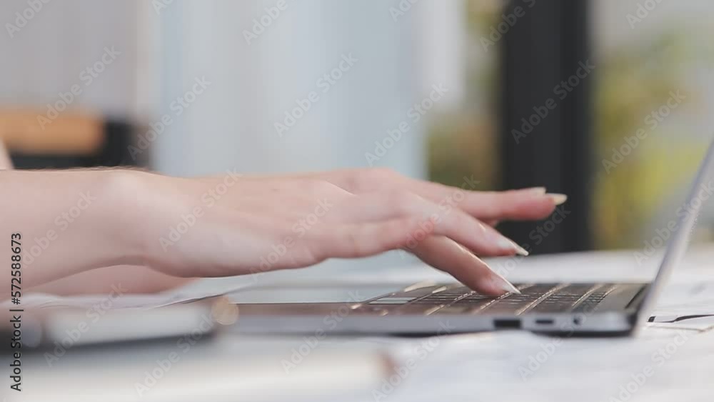 Asian Business woman using calculator and laptop for doing math finance on an office desk, tax, report, accounting, statistics, and analytical research concept Asian Business woman using calculator and laptop for doing math finance on an office desk, tax, report, accounting, statistics, and analytical research concept