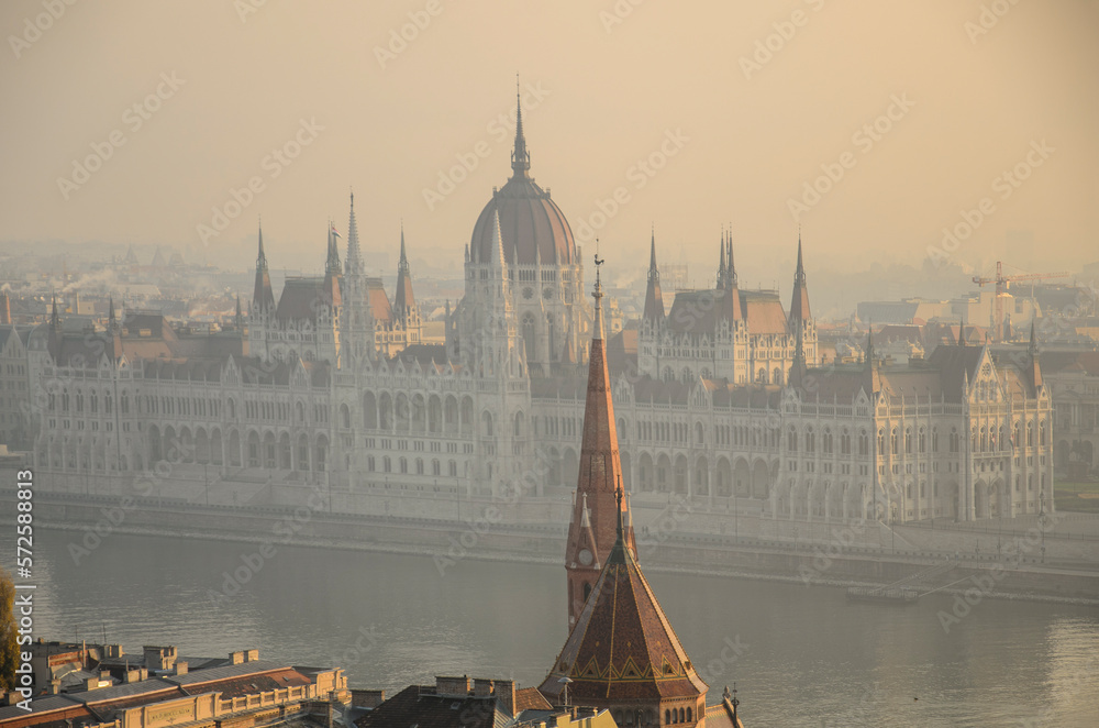 The Hungarian Parliament building in the early summer haze. Budapest, Hungary.