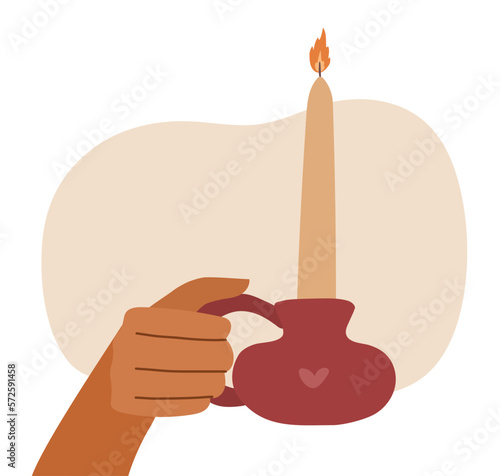 Hand holding a ceramic candle holder with a vintage candle. Vector hand drawn illustration isolated on white.