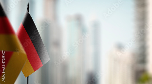 Bild auf Leinwand A small Germany flag on an abstract blurry background