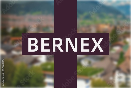 Bernex: Der Name der schweizer Stadt Bernex im Kanton Genève vor einem Hintergrundbild photo