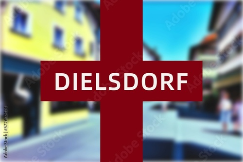 Dielsdorf: Der Name der schweizer Stadt Dielsdorf im Kanton Zürich vor einem Hintergrundbild photo