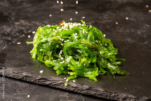 Asian seaweed chukka salad on a dark background.