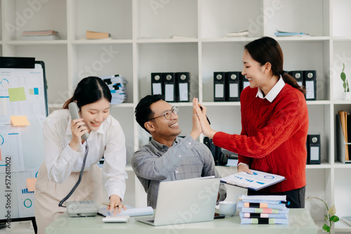 Business team discuss at meeting room. working together with laptop ,tablet and smart phone on desk Financial accountant , planner , meeting , introduction concept. At office..