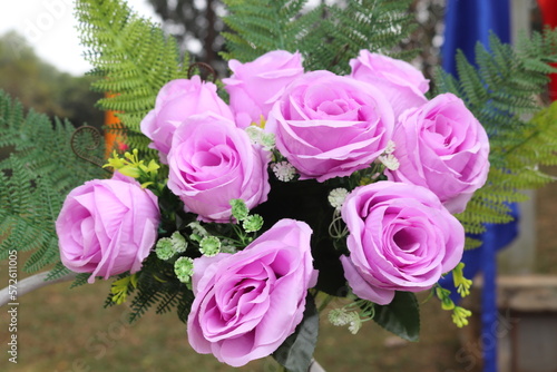 : Wedding flowers in different shades of pink and red, roses