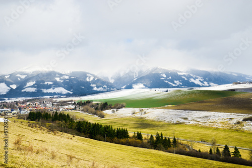 View from Haj-Nicovo to West Tatras near city Liptovsky Mikulas after winter. Slovakia, Liptov region.