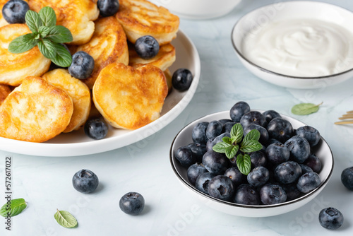 Homemade mini pancakes with blueberries