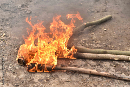 Burning torches on the ground. A medieval torch. Athens, Greece. Flame. Wooden Torch