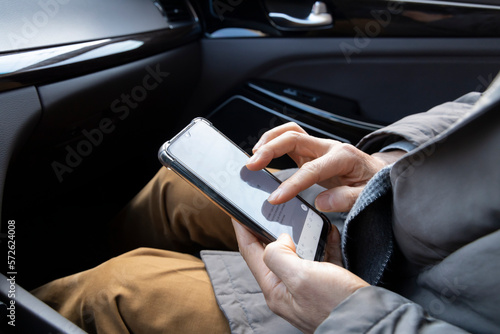 a person texting on a cell phone