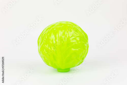 white duckling young cabbage plastic toy on a white background