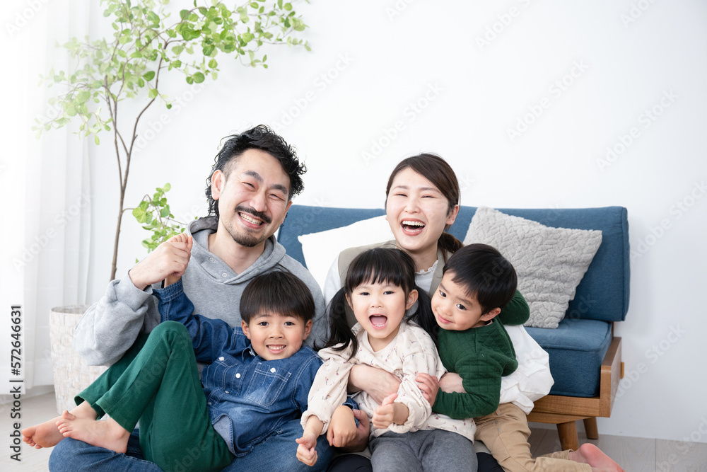 Portrait of an Asian family of five children of the same age. Portrait of an Asian family of five children of the same age.