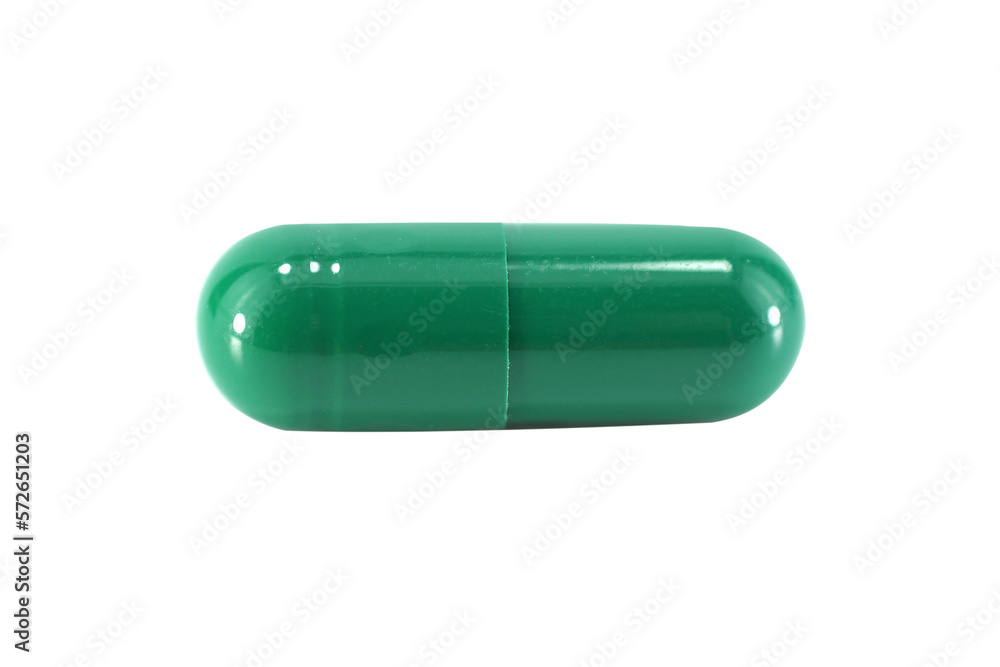 green capsule pills isolated on white background.