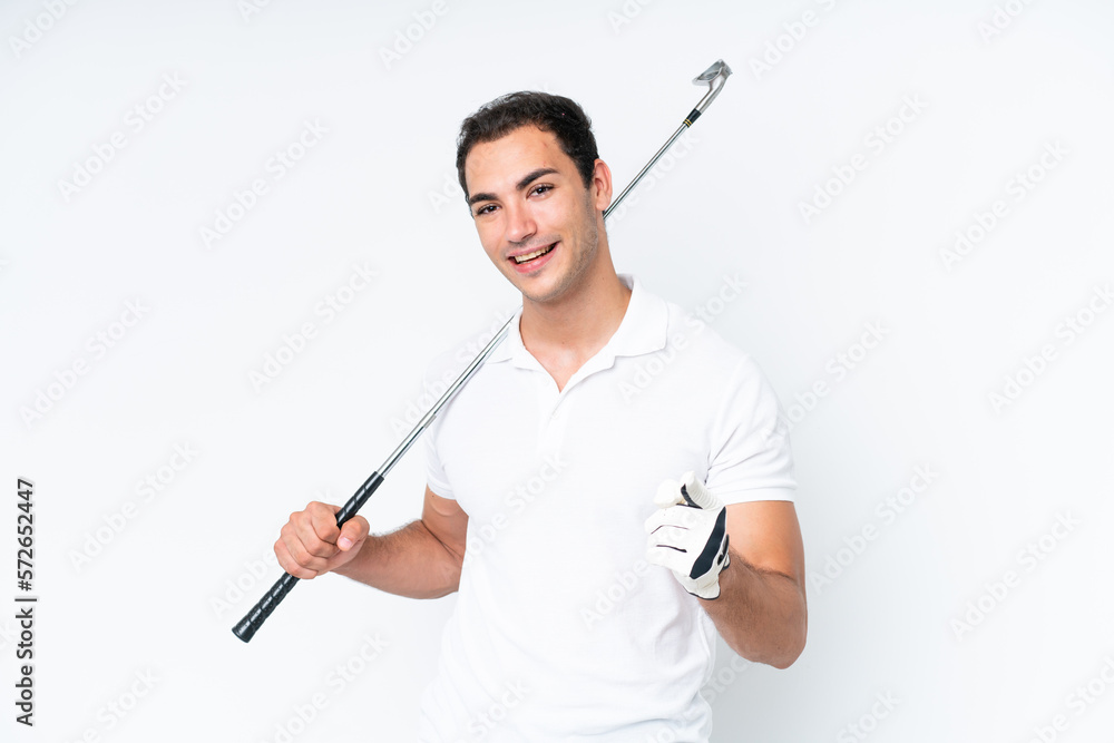 Young caucasian man isolated on white background playing golf and pointing to the front Young caucasian man isolated on white background playing golf and pointing to the front