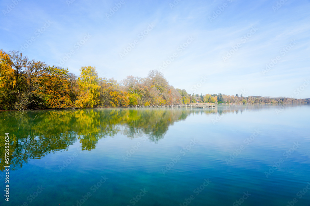 Idyllic autumn landscape by the lake.
