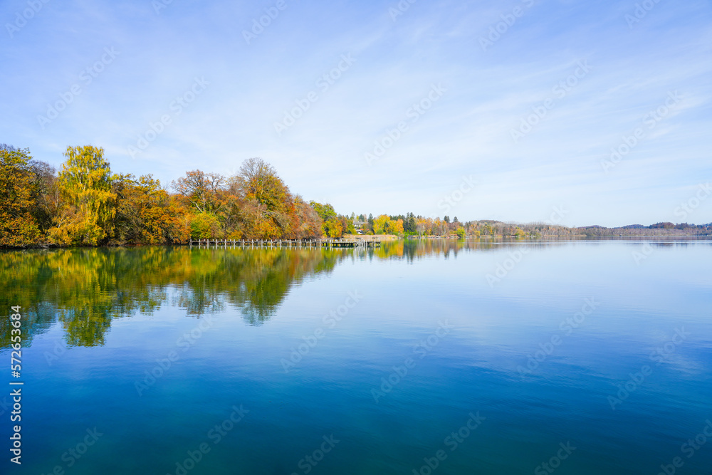 Idyllic autumn landscape by the lake.
