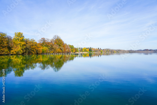 Idyllic autumn landscape by the lake. 