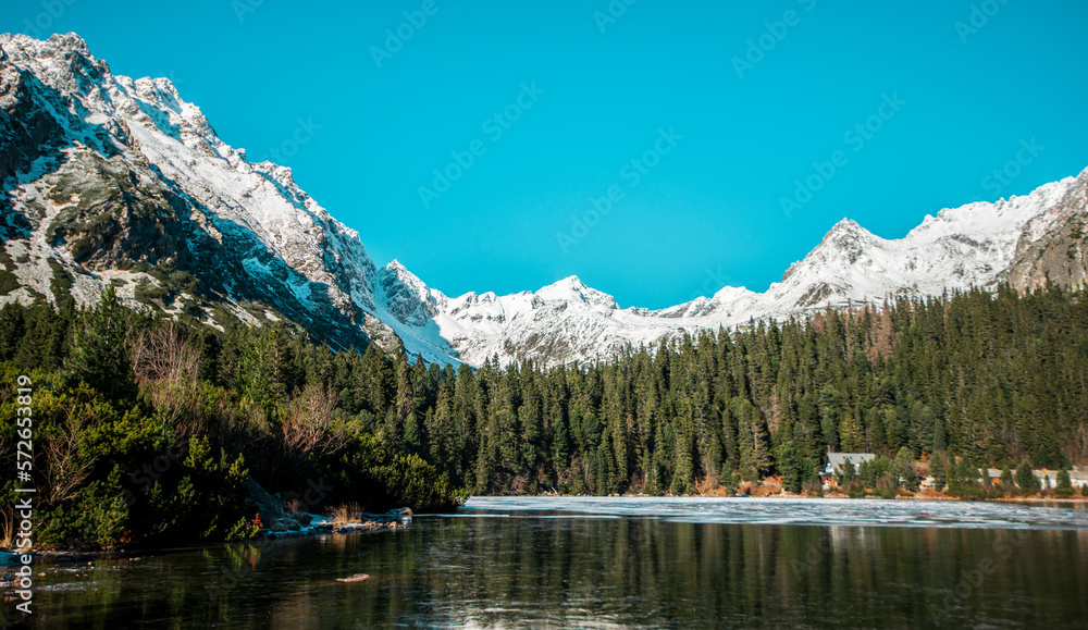 Awesome Sunny Day. Hiking Trail near famous Lake Popradske Pleso. Incredible mountains Scenery, Popular travel destination. High Tatras. Slovakia. Wonderful Nature Landscape in winter months.
