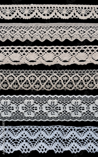 white vintage macrame lace isolated on black background