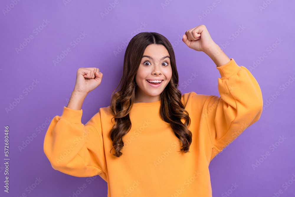 Photo of overjoyed lady dressed trendy orange outfit scream yes hooray rejoice surprise award isolated on purple color background Photo of overjoyed lady dressed trendy orange outfit scream yes hooray rejoice surprise award isolated on purple color background