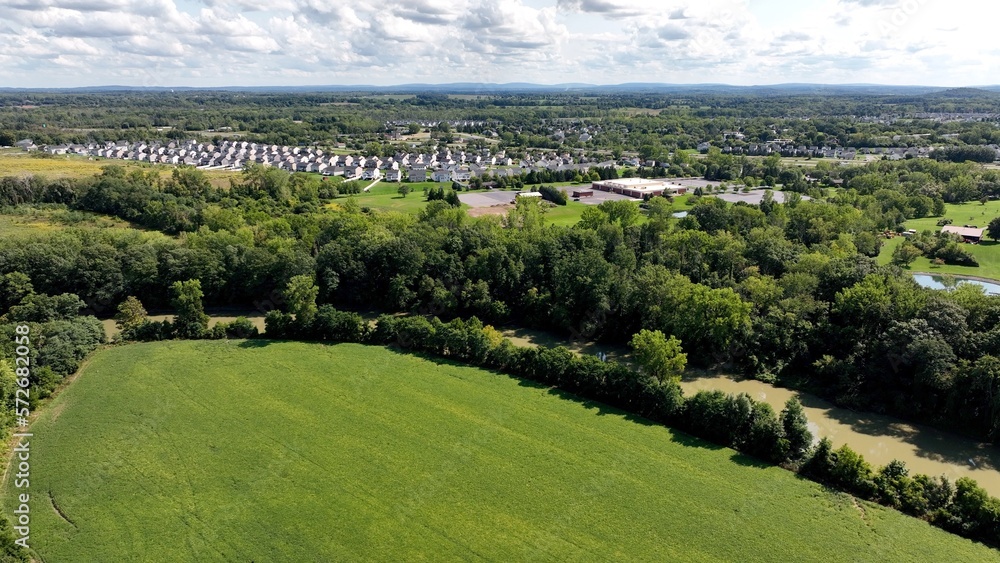 Rural neighborhood in American countryside with houses and people living and raising families