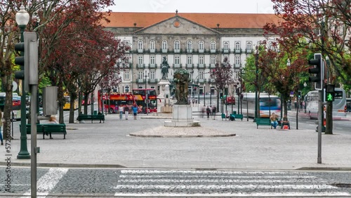 The Liberty Square in the historic centre of Porto timelapse. Zebra crossing over the road. Porto is one of the most popular tourist destinations in Europe. photo