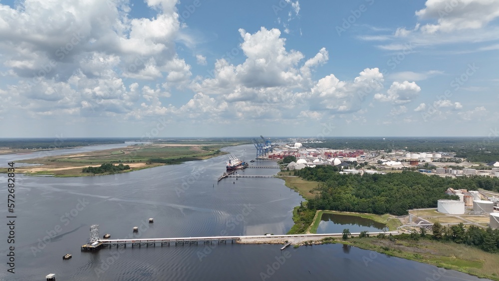 Wilmington, NC shipping port with cargo containers docked and unloading Stock Photo Adobe Stock