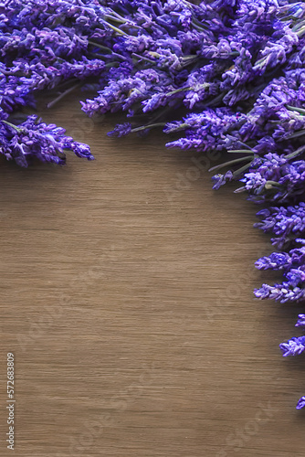 Fresh Flowers of Lavender Bouquet  top view on brown wooden background created with Generative AI Technology