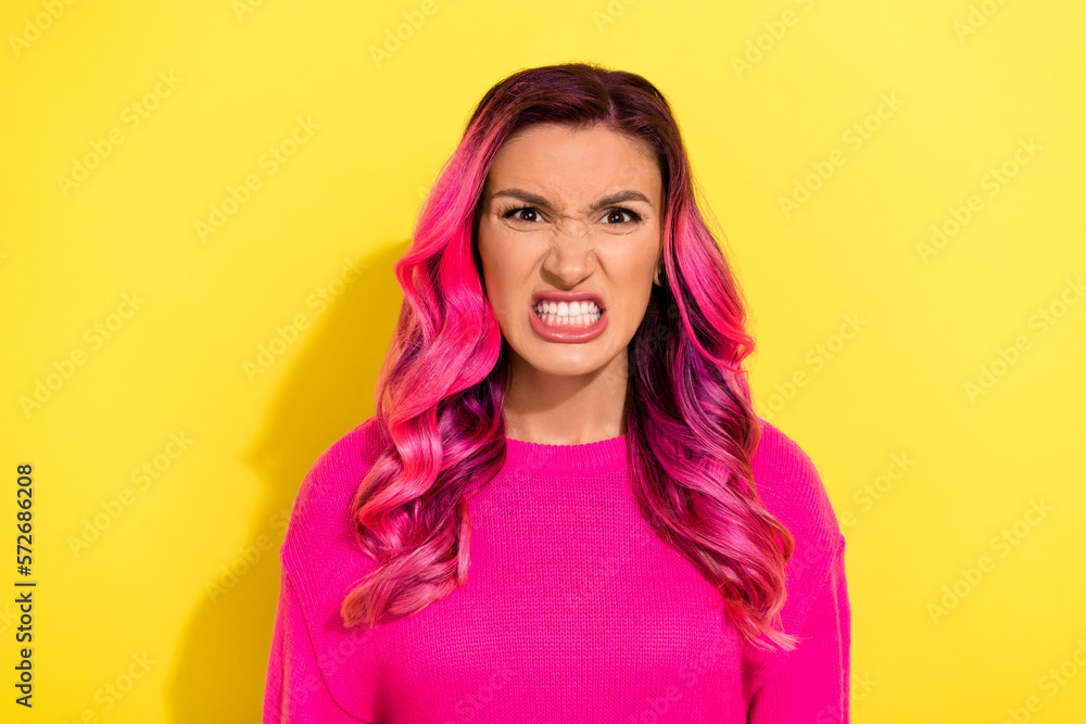 Portrait of grumpy millennial lady feel offense have conflict show teeth bright haircut isolated on yellow color background - obrazy, fototapety, plakaty 