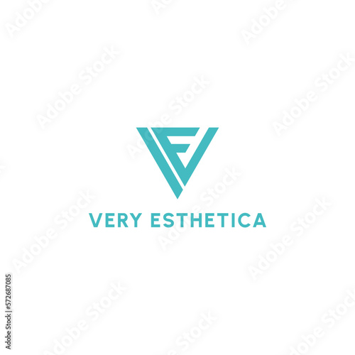 Abstract initial letter VE or EV logo in blue color isolated in white background applied for medical esthetics office logo also suitable for the brands or companies have initial name EV or VE.
