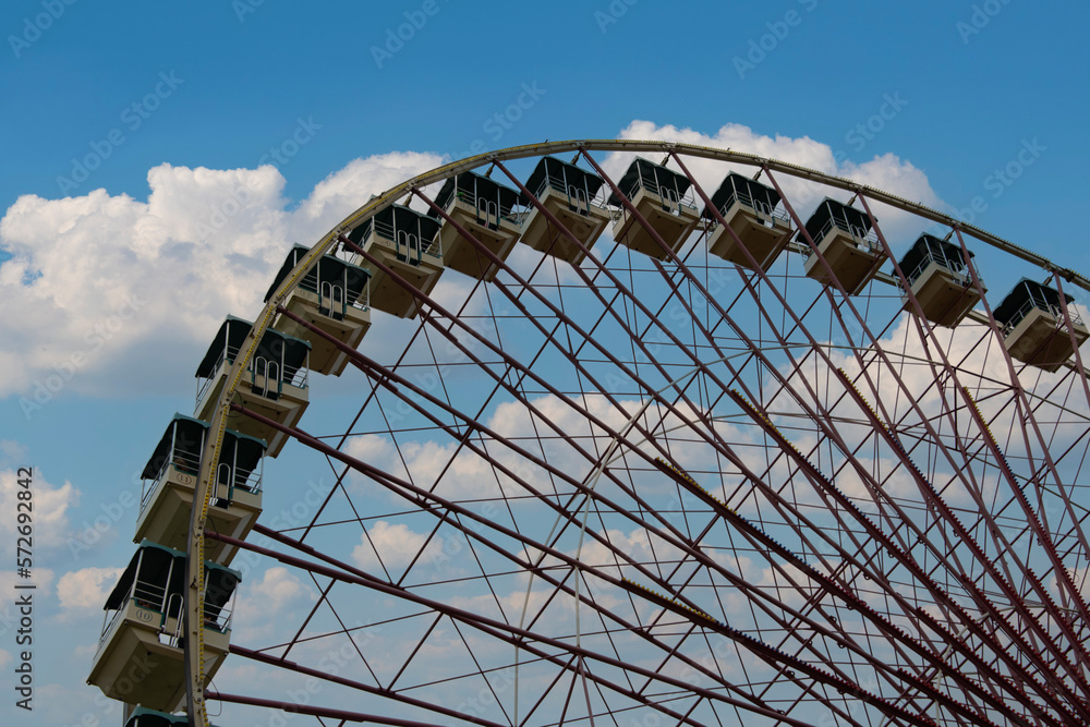 a ferris wheel with a claer sky background